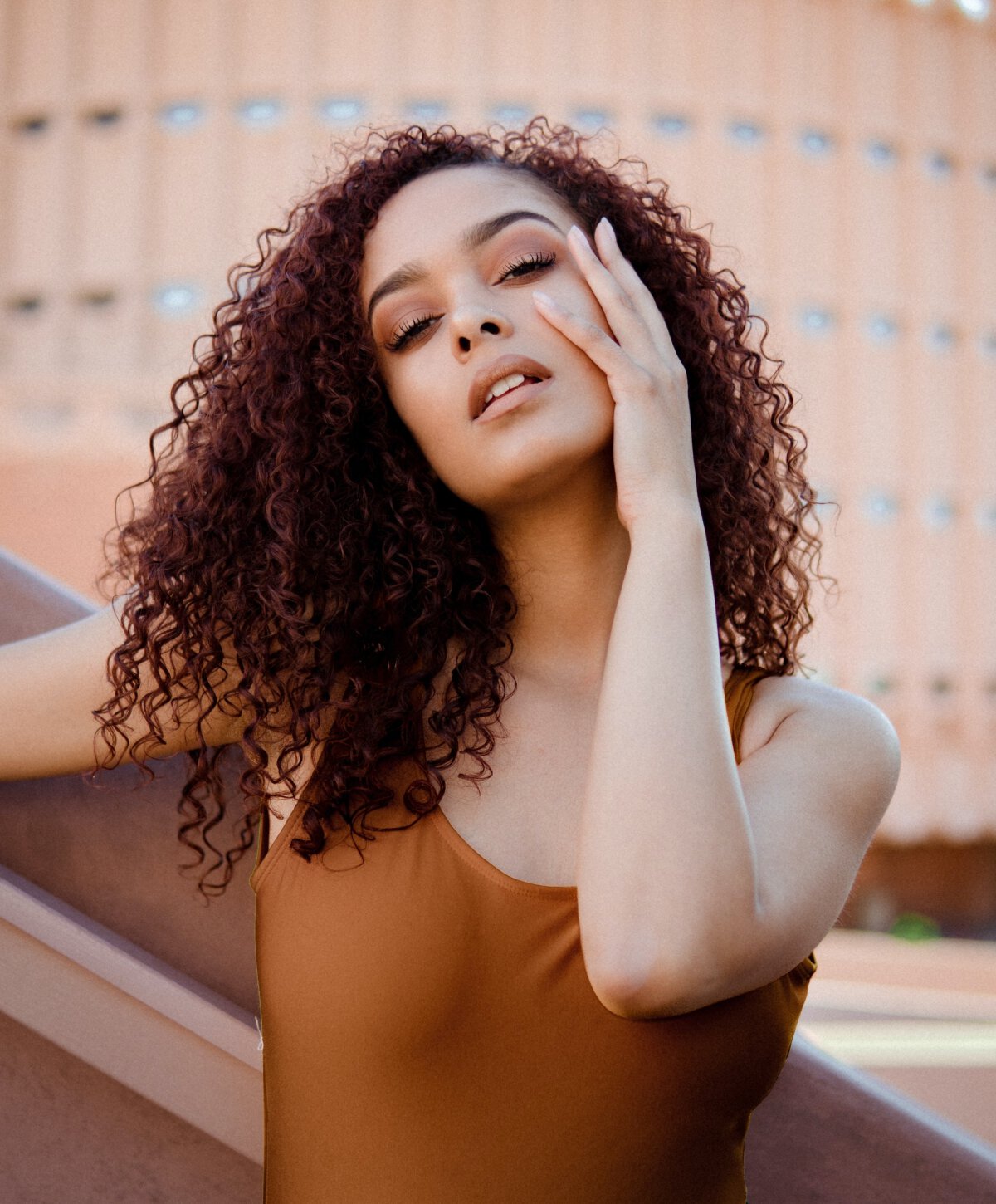 Murrieta lip filler model with curly hair